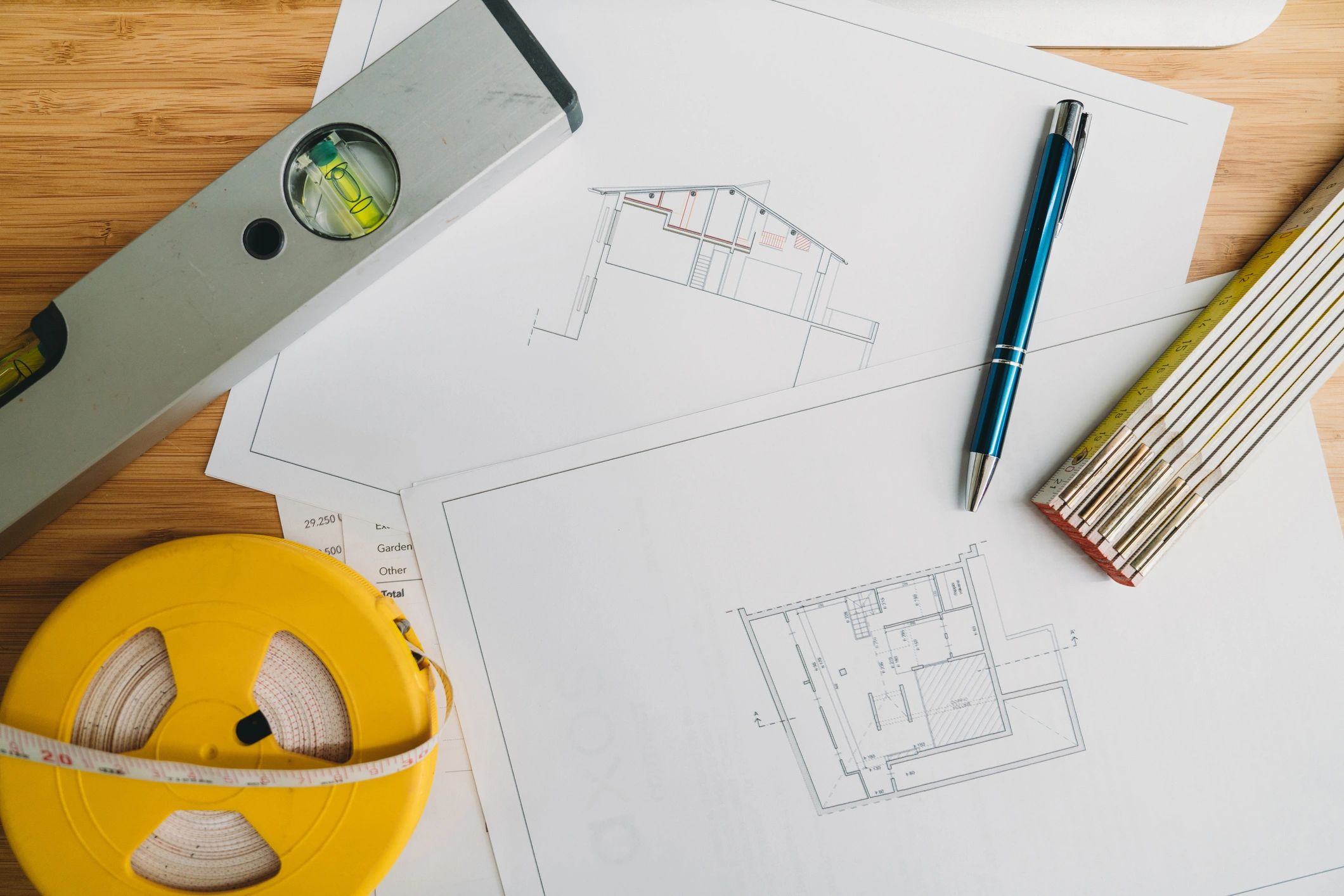 Architectural blueprint plans on a desk